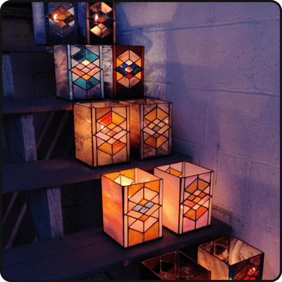 Finished paper lamps glowing on a staircase