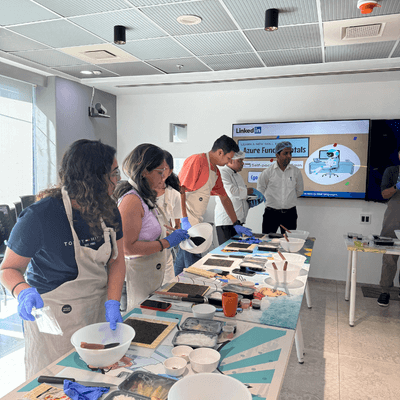 A team fully absorbed in their kits during a Kitsters offsite session