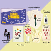 Contents of solar printing cyanotype kit, potassium ferricyanide, ferric ammonium citrate, pressed flowers, foam stickers, hydrogen peroxide, wooden clips, flat brush