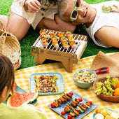 DIY Barbecue Kit tutorial showing how to make skewers with grilled vegetables and meat, using teriyaki sauce, and serving with coleslaw from Kitsters.in