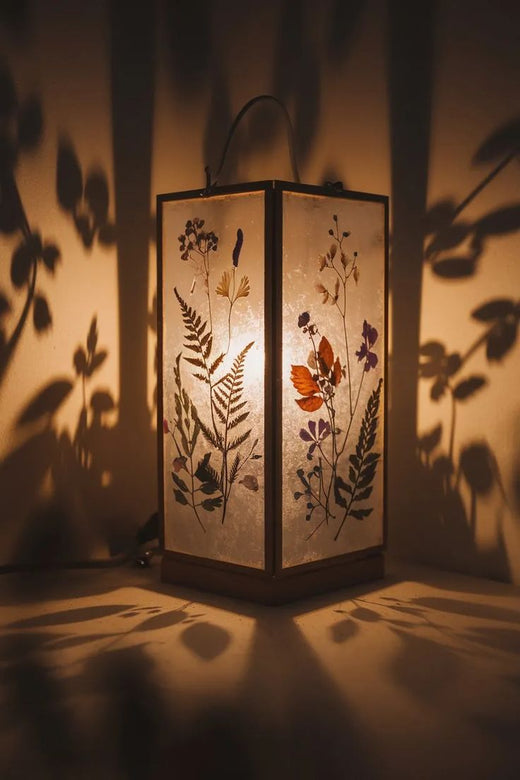 A finished paper lamp glowing after dark