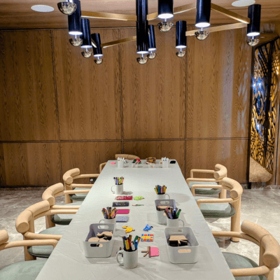 A Kitsters DIY station laid out with material trays before guests arrive