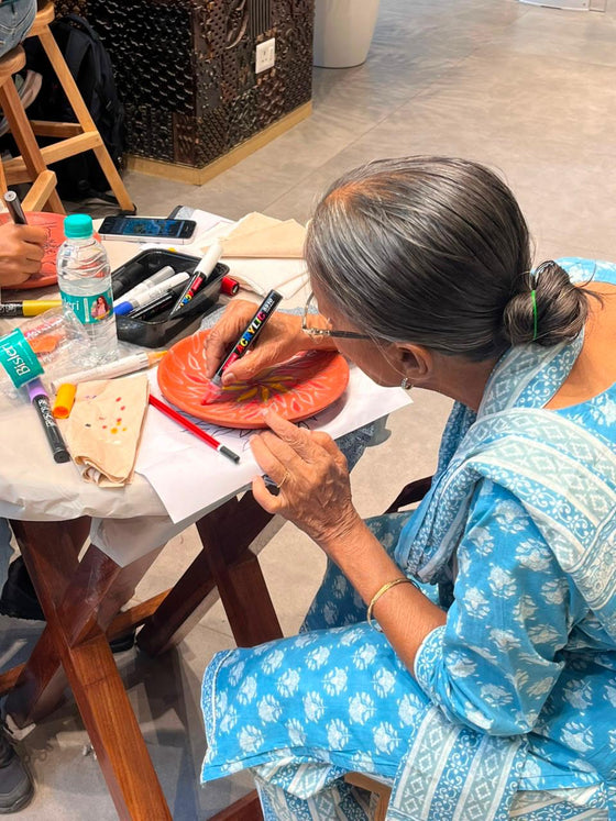 Terracotta Plate Painting at a Kitsters DIY station